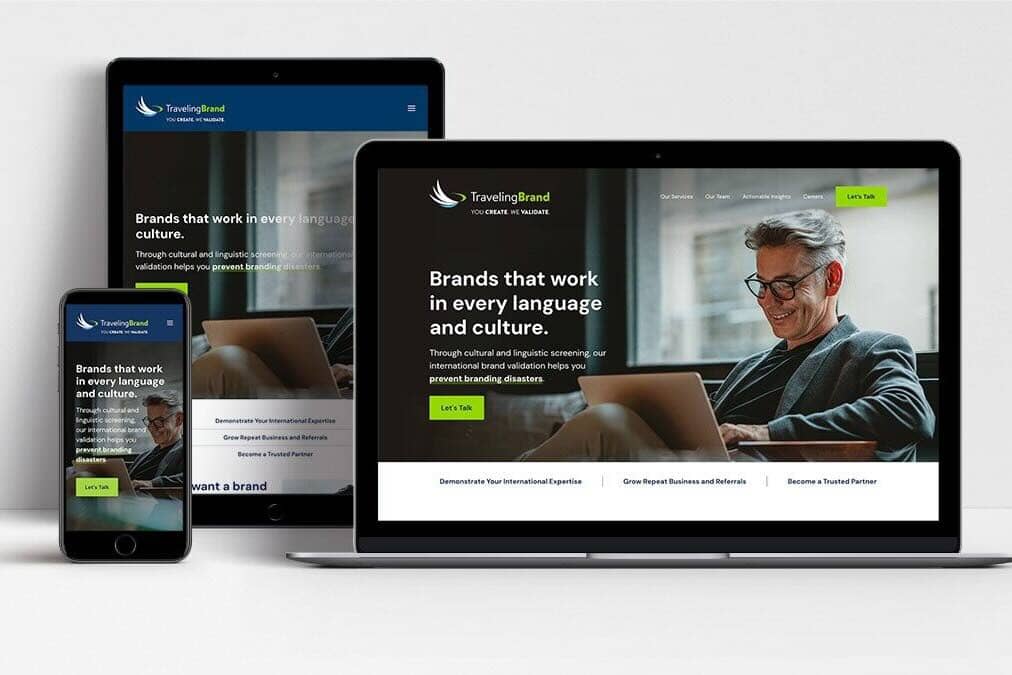 Traveling Brand website shown on laptop, tablet and mobile