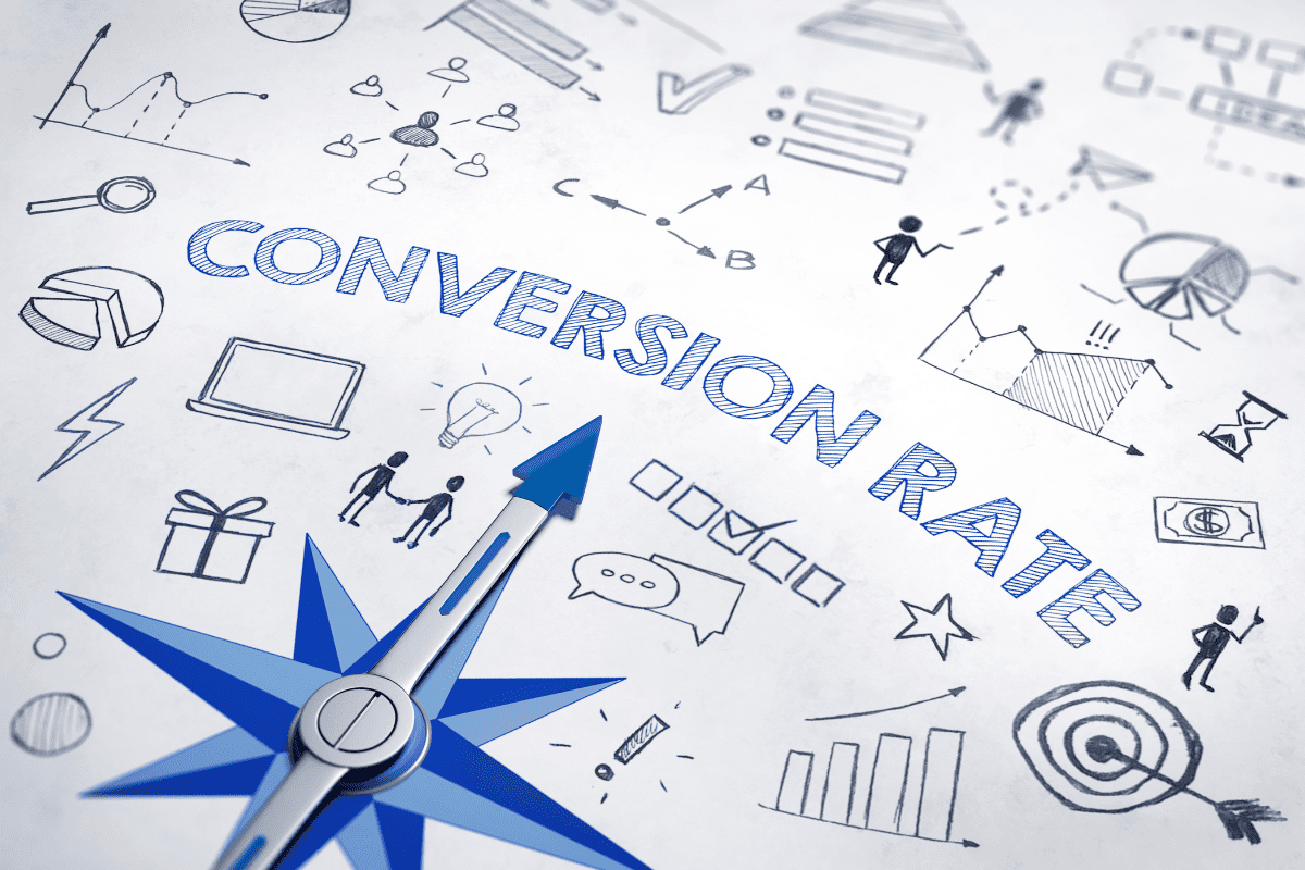 compass pointing towards the words conversion rate with other business icons