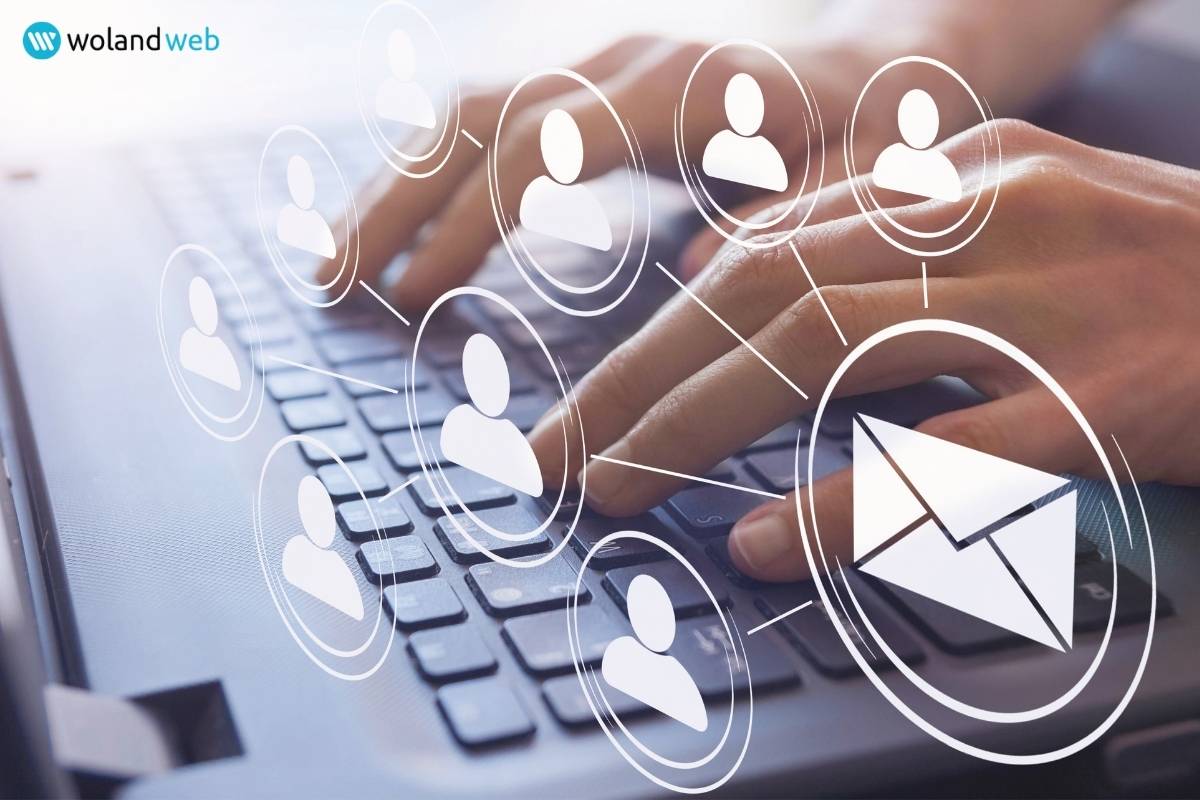 hand typing on keyboard with icons of email and people receiving the email