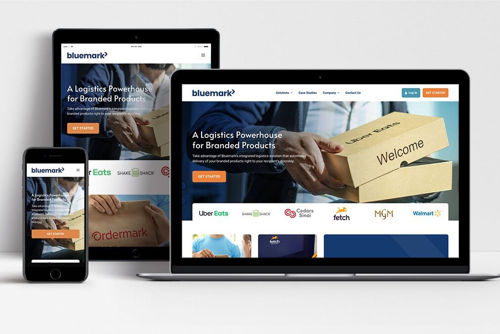 Bluemark website shown on laptop, tablet and mobile